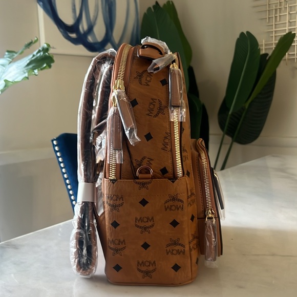 Brand new small  Classic MCM bookbag authentic. - Picture 2 of 4